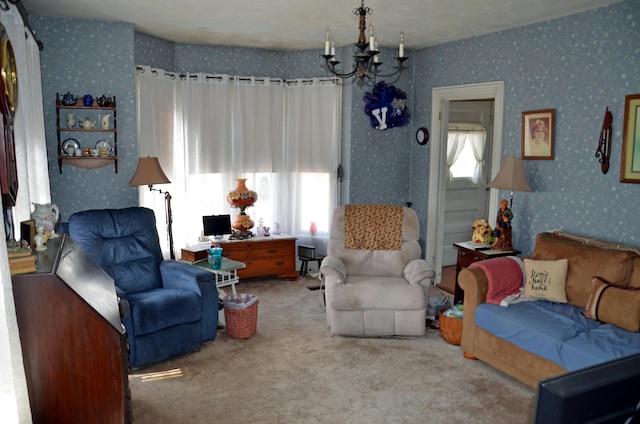 23 Park St, West Paris, ME 04289 - carpeted living room with wallpapered walls and a notable chandelier