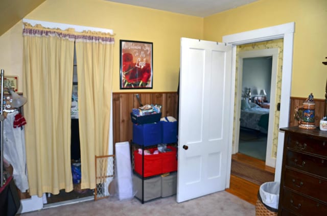 23 Park St, West Paris, ME 04289 - carpeted bedroom with a wainscoted wall and wooden walls