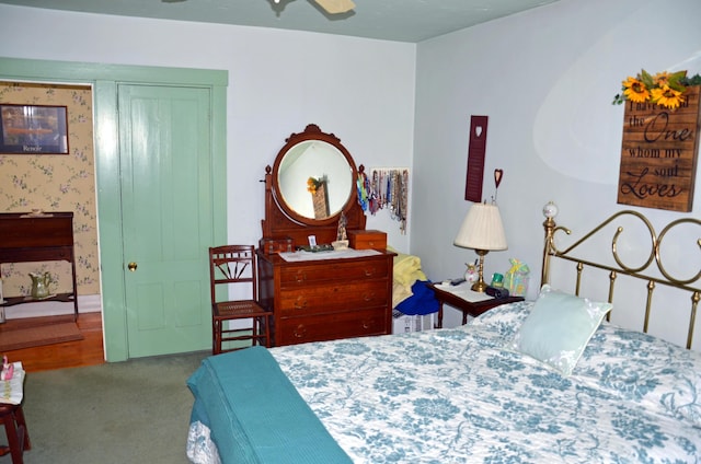 23 Park St, West Paris, ME 04289 - carpeted bedroom with wallpapered walls and a ceiling fan