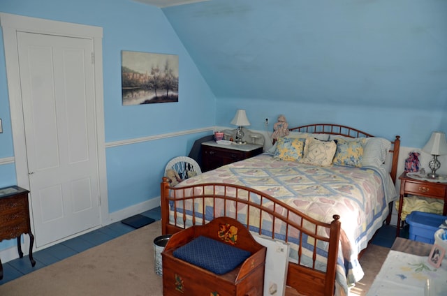 23 Park St, West Paris, ME 04289 - bedroom with baseboards, carpet floors, and vaulted ceiling