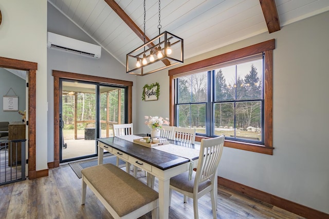 dining area featuring vaulted ceiling with beams, an inviting chandelier, wood finished floors, and a wall mounted air conditioner