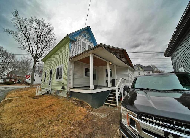 view of home's exterior featuring covered porch