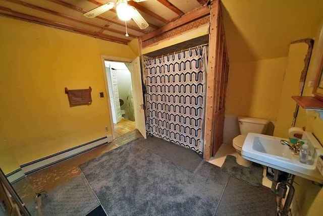 full bath with a baseboard heating unit, toilet, a sink, ceiling fan, and curtained shower