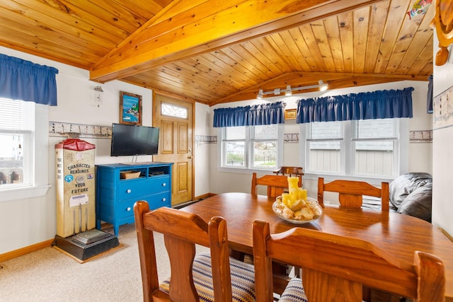 22 Gold Ribbon Dr, Wells, ME 04090 - dining area with baseboards, vaulted ceiling with beams, wooden ceiling, and light carpet