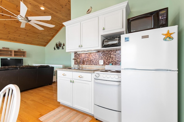 22 Gold Ribbon Dr, Wells, ME 04090 - kitchen with white appliances, light wood-type flooring, white cabinets, a sink, and backsplash