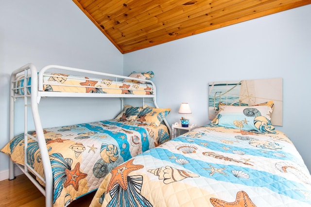 22 Gold Ribbon Dr, Wells, ME 04090 - bedroom featuring wood finished floors, wooden ceiling, and lofted ceiling