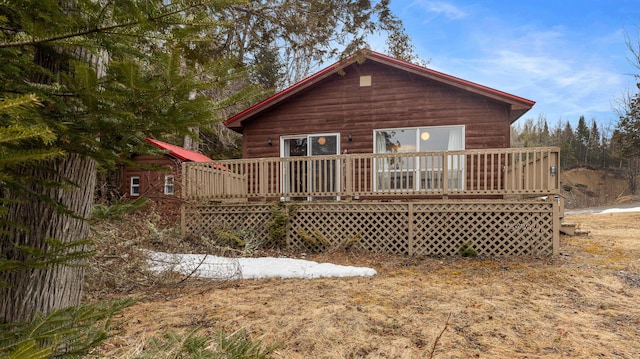 119 W Conroy Lake Rd, Monticello, ME 04760 - rear view of house with a deck