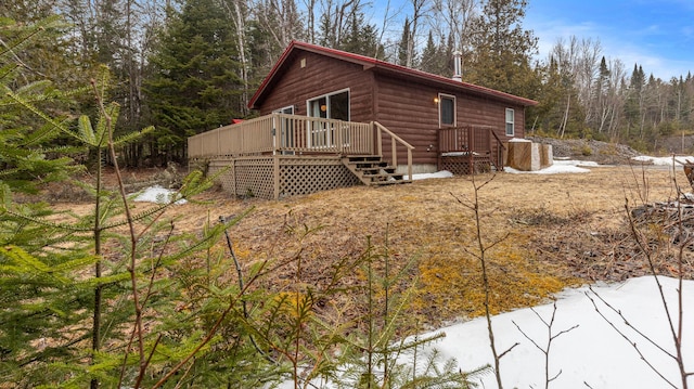 119 W Conroy Lake Rd, Monticello, ME 04760 - view of side of home with a wooden deck