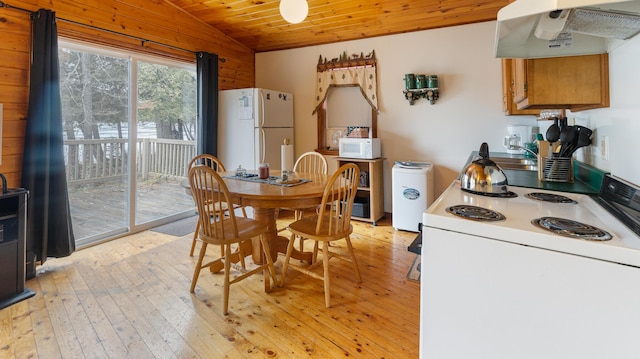 119 W Conroy Lake Rd, Monticello, ME 04760 - dining area with light wood-style floors, wooden ceiling, and vaulted ceiling