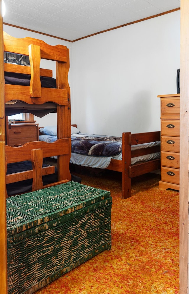 119 W Conroy Lake Rd, Monticello, ME 04760 - carpeted bedroom with ornamental molding
