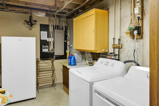 198 Hooper Rd, Shapleigh, ME 04076 - laundry room with cabinet space, independent washer and dryer, electric panel, and a sink