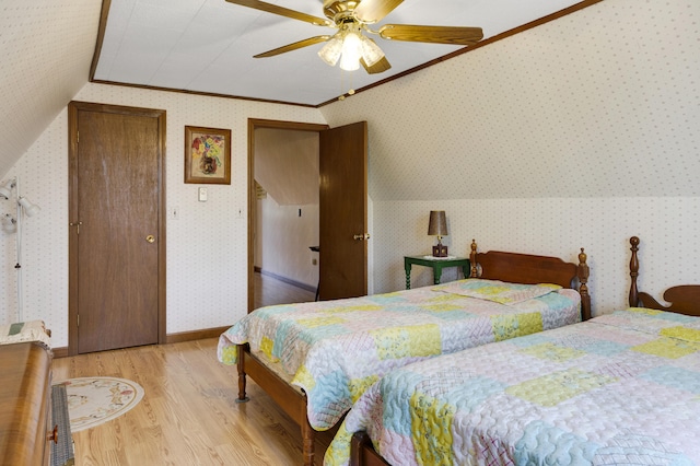 198 Hooper Rd, Shapleigh, ME 04076 - bedroom featuring baseboards, wallpapered walls, crown molding, light wood-style floors, and ceiling fan