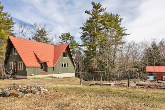 198 Hooper Rd, Shapleigh, ME 04076 - view of home's exterior with a standing seam roof, metal roof, and entry steps
