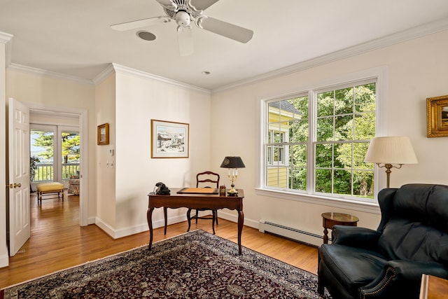 21 Bristol Dr, Rockport, ME 04856 - home office featuring baseboards, light wood-style floors, a baseboard radiator, and crown molding