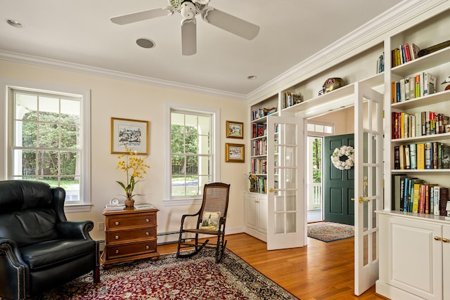 21 Bristol Dr, Rockport, ME 04856 - living area featuring light wood-style floors, crown molding, french doors, and ceiling fan