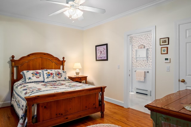 21 Bristol Dr, Rockport, ME 04856 - bedroom with crown molding, ceiling fan, baseboard heating, wood finished floors, and baseboards