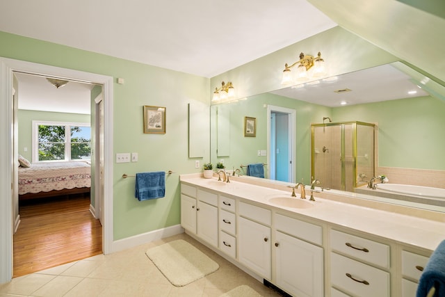 21 Bristol Dr, Rockport, ME 04856 - bathroom featuring a sink, tile patterned flooring, double vanity, and a stall shower