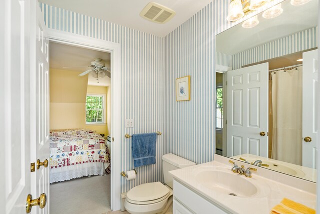 21 Bristol Dr, Rockport, ME 04856 - bathroom with wallpapered walls, ensuite bathroom, and visible vents