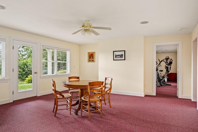 21 Bristol Dr, Rockport, ME 04856 - dining area with dark carpet, baseboards, and a ceiling fan