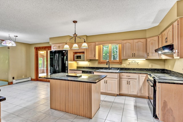 kitchen featuring a baseboard heating unit, a center island, black appliances, under cabinet range hood, and a sink