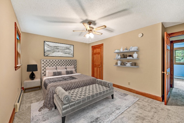 bedroom featuring ceiling fan, carpet, a textured ceiling, a baseboard radiator, and baseboards