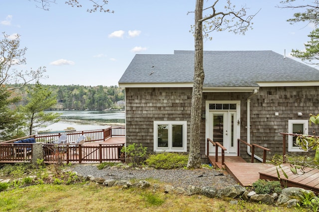 35 Barrows Rd, Boothbay Harbor, ME 04538 - rear view of property with roof with shingles and a deck with water view