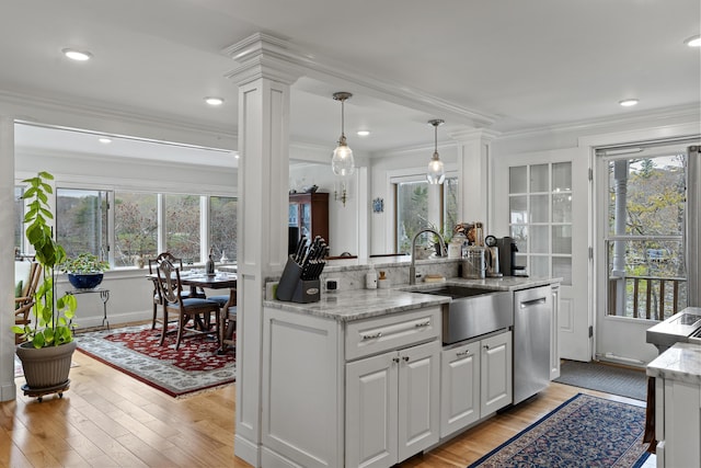 35 Barrows Rd, Boothbay Harbor, ME 04538 - kitchen featuring a sink, dishwasher, light wood-style flooring, healthy amount of natural light, and ornamental molding