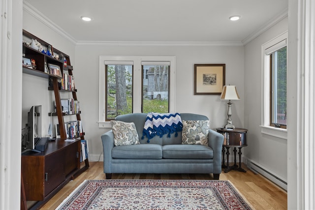 35 Barrows Rd, Boothbay Harbor, ME 04538 - living area featuring a baseboard radiator, light wood-type flooring, plenty of natural light, crown molding, and recessed lighting