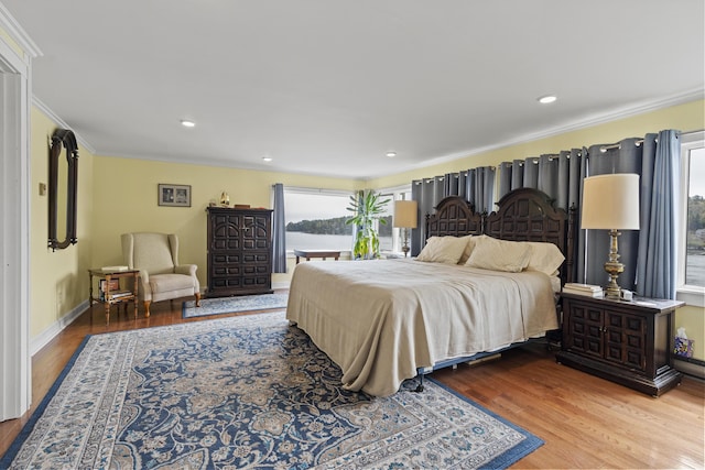 35 Barrows Rd, Boothbay Harbor, ME 04538 - bedroom featuring wood finished floors, ornamental molding, baseboards, and recessed lighting