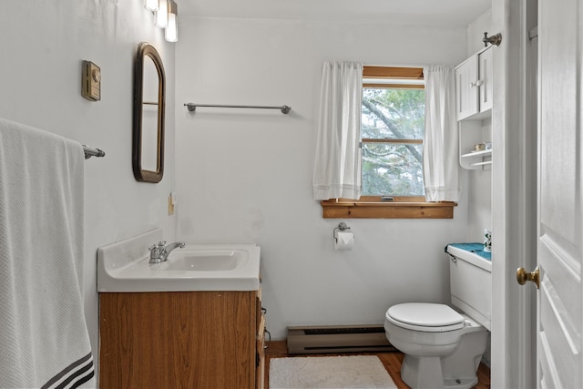 35 Barrows Rd, Boothbay Harbor, ME 04538 - full bath featuring baseboard heating, toilet, and vanity