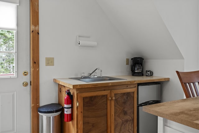 35 Barrows Rd, Boothbay Harbor, ME 04538 - bar with a sink, freestanding refrigerator, and lofted ceiling