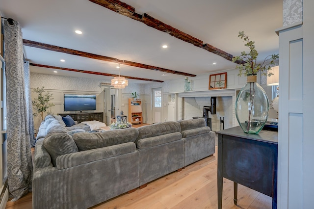 917 Main St, Fryeburg, ME 04037 - living room with wood finished floors, beam ceiling, and recessed lighting