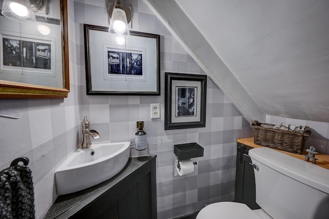 917 Main St, Fryeburg, ME 04037 - bathroom with tile walls, toilet, and vanity