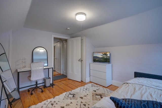 917 Main St, Fryeburg, ME 04037 - bedroom featuring vaulted ceiling, hardwood / wood-style floors, and baseboards