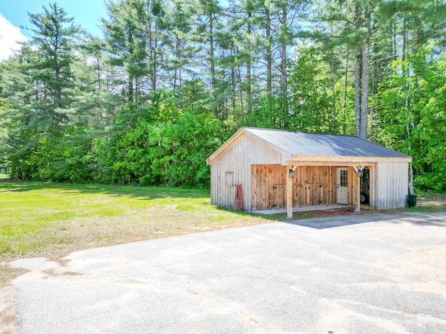 917 Main St, Fryeburg, ME 04037 - garage with asphalt driveway
