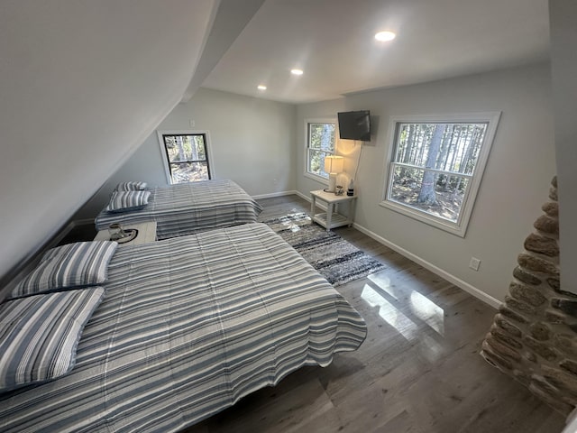 93 Goods Point Rd, Steuben, ME 04680 - bedroom with wood finished floors, baseboards, lofted ceiling, and recessed lighting