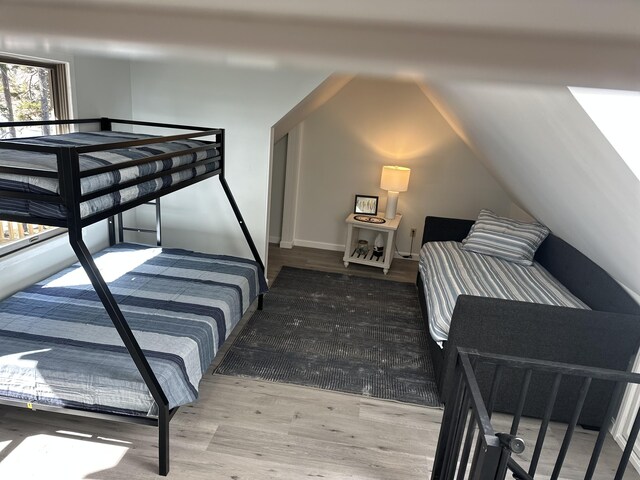 93 Goods Point Rd, Steuben, ME 04680 - bedroom with wood finished floors and lofted ceiling