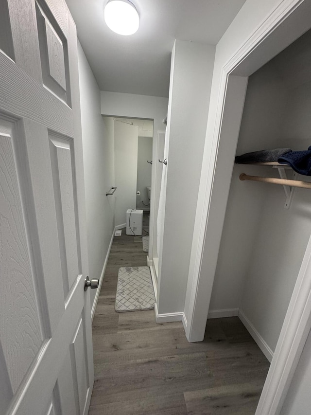 93 Goods Point Rd, Steuben, ME 04680 - bathroom featuring toilet, wood finished floors, and baseboards