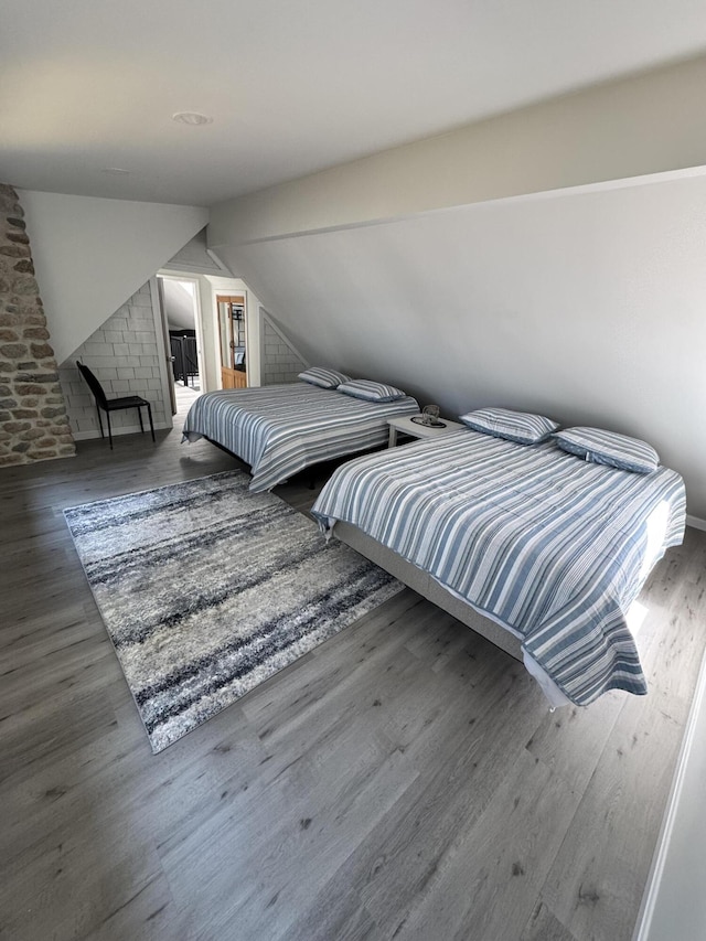 93 Goods Point Rd, Steuben, ME 04680 - bedroom with vaulted ceiling and wood finished floors