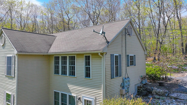 162 Roosevelt Trl Unit 3, Casco, ME 04015 - view of side of home with a shingled roof