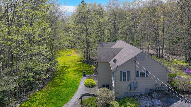 162 Roosevelt Trl Unit 3, Casco, ME 04015 - view from above of property with a heavily wooded area