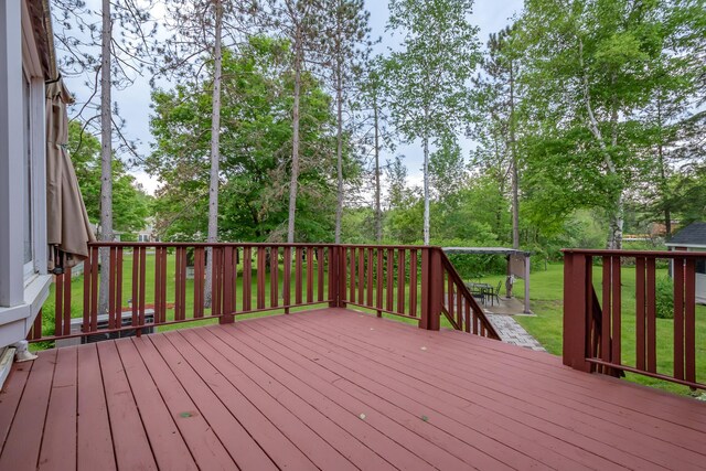 13 Park St, Dover-Foxcroft, ME 04426 - deck featuring view of wooded area and a lawn