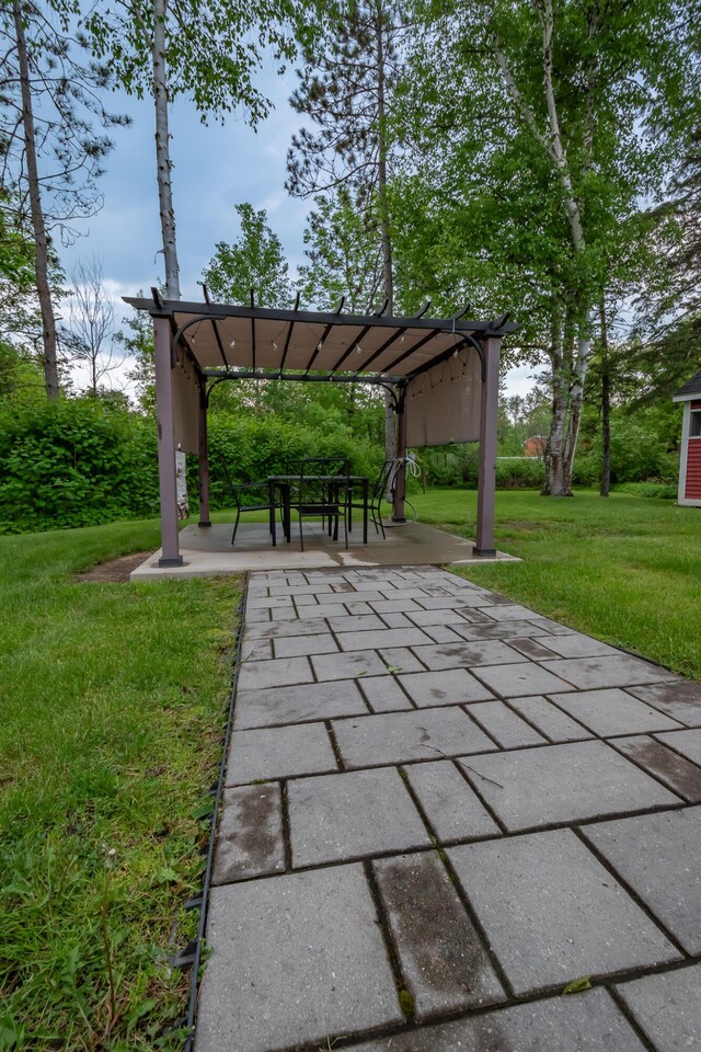 13 Park St, Dover-Foxcroft, ME 04426 - view of home's community with a pergola and a yard