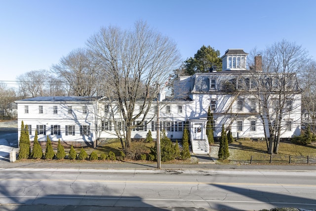 103 S St, Bath, ME 04530 - view of front facade with fence and a chimney