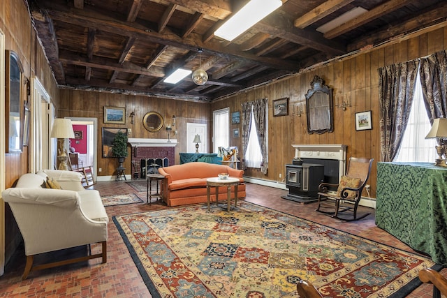 103 S St, Bath, ME 04530 - living area with a fireplace, a healthy amount of sunlight, wood walls, and a baseboard heating unit
