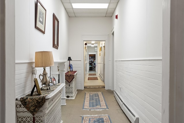 103 S St, Bath, ME 04530 - hall with wainscoting, a drop ceiling, and a baseboard radiator
