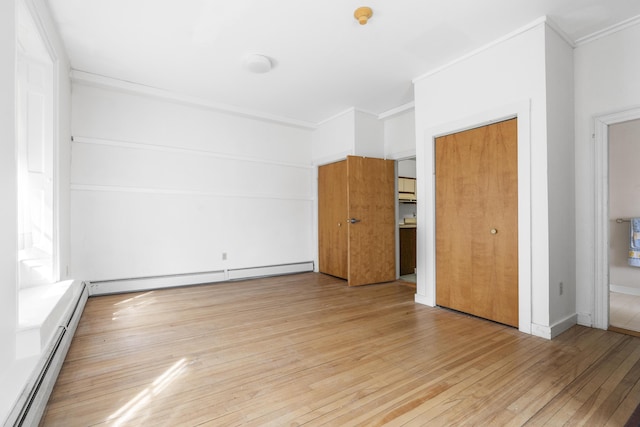 103 S St, Bath, ME 04530 - unfurnished bedroom with a baseboard radiator, light wood-type flooring, and crown molding