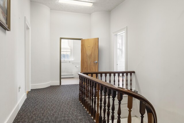 103 S St, Bath, ME 04530 - hall featuring carpet flooring, an upstairs landing, baseboards, a textured ceiling, and baseboard heating