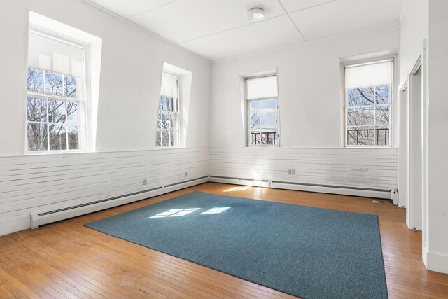 103 S St, Bath, ME 04530 - spare room with hardwood / wood-style floors and wainscoting