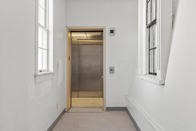 103 S St, Bath, ME 04530 - hall featuring elevator, carpet flooring, and baseboards